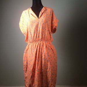 Medium sleeveless confortable orange dress with blue birds